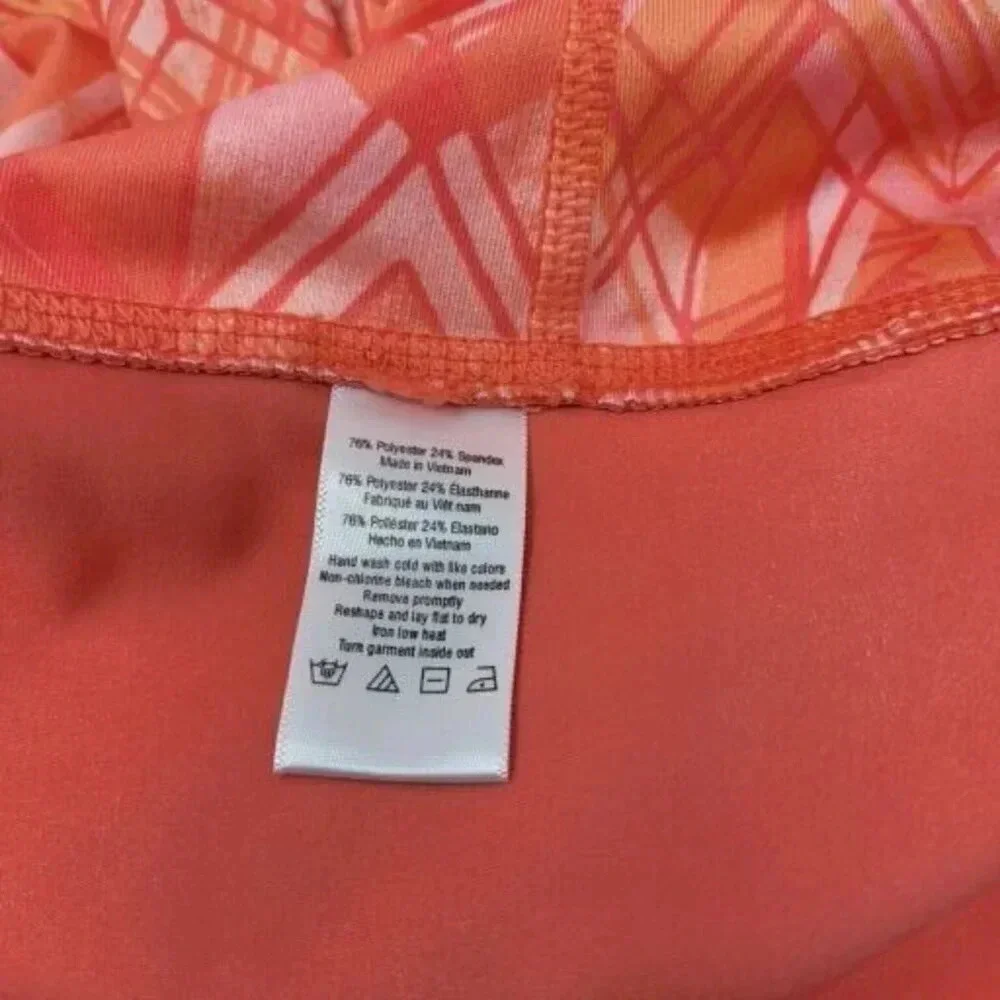 Alo Yoga Geometric Capri Cropped Leggings in Guava Indio Orange/Coral Size M